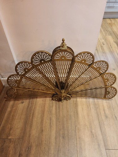 Antique peacock griffin fire